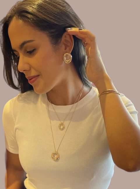 Brinco Anastásia Oval Vazado Banhado a Ouro 18k - comprar online