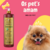 Frasco de shampoo suave Esmeralda Cereja e Avelã da Dolce Pet ao lado de um cachorro fofo com língua de fora.