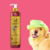 Frasco de Shampoo Limpeza Intensa Safira Cereja e Avelã da Dolce Pet, com um cachorro usando um chapéu verde ao lado.