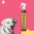 Frasco de fluído texturizador Volume Supremo Âmbar Cereja E Avelã Dolce Pet 300 ml ao lado de um cachorro sorridente.