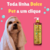 Cachorro envolto em uma toalha com frasco de shampoo Esmeralda Bambu Mossô Dolce Pet ao lado.