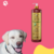 Frasco de shampoo Suave Esmeralda Bambu Mossô de 1L com um cachorro sorridente ao lado.