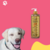 Frasco de shampoo Volume Supremo Âmbar Cereja e Avelã de 500ml da Dolce Pet, ao lado de um cachorro sorridente.