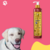 Frasco de shampoo Limpeza Intensa Safira Cereja e Avelã da marca Dolce Pet, ao lado de um cachorro sorridente.