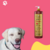 Frasco de shampoo neutralizador de odores Turmalina Cereja e Avelã da Dolce Pet, com um cachorro sorridente ao lado.