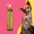 Frasco de máscara para pets da Dolce Pet, sabor Âmbar, Cereja e Avelã, com um cachorro e um gato ao fundo.