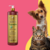 Frasco de shampoo Suave Esmeralda Cereja e Avelã da Dolce Pet, com um cachorro e um gato ao fundo.