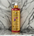 Frasco de Shampoo Clareador Tonalizante Ametista Bambu 500ml da Dolce Pet em fundo de mármore.