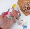 Faixa Borbo Flor (com pompom)