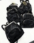 Mochila preta dos anos 90 - couro na internet