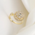 Anillo Ajustable Flor Giratoria Con Zirconias Baño Oro 18k - comprar en línea