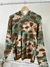 Sweater con capucha estampado