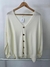 Cardigan crema botones