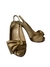 Louboutin gold na internet