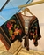 Cropped multiformas manga morcego estampa jungle chic escura - comprar online