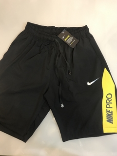 Bermuda Nike Pro amarela
