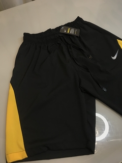 Bermuda Nike Pro amarela na internet