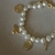 Pulseira Fé Pérolas com Banho de Ouro 18k