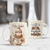 Caneca de Natal com desenho de boneco de neve e mensagens natalinas.