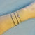 bracelete aberto trançado banhado a rodio prata