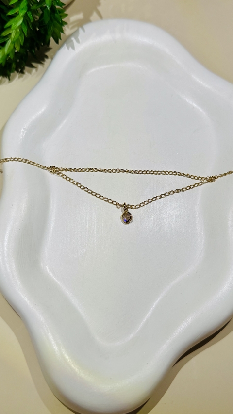 TORNOZELEIRA COM 1 CORRENTES PONTO DE LUZ