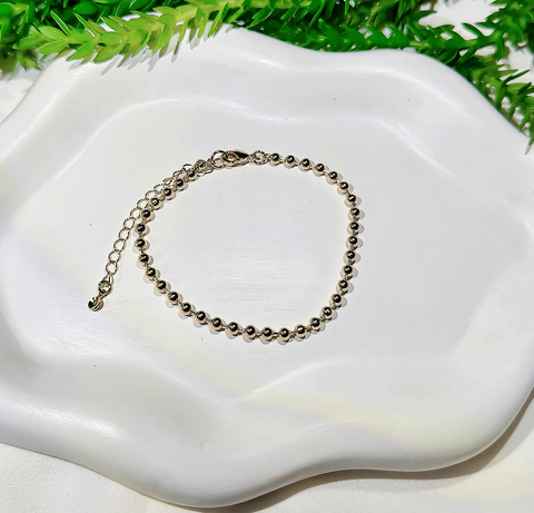 PULSEIRA BOLINHAS ESPASSADINHA