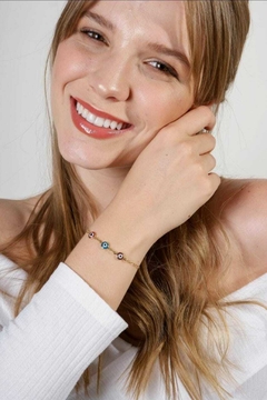 Pulseira olho grego com regulagem