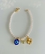 Pulseira de pérolas com pingentes de olho grego, trevo de quatro folhas e ponto de luz, no banho hipoalergênico de ouro 18k