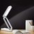 Luminária de mesa dobrável Top Light recarregável via USB, com cabo incluso.
