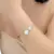 Bracelete Trevo Duplo em Aço na internet