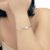 Bracelete Trevo Central com Zircônias em Aço - comprar online
