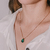 Conjunto Colar Pingente Gota Verde e Brincos Argola Dupla Banhado Ouro 18k na internet
