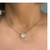 Colar com Pingente Redondo Cravejado Zircônia Cristal Banhado em Ouro 18k na internet