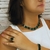 Colar Riviera Pedra Grande Retangular e Gota Verde Esmeralda Banhado em Ródio na internet