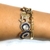 Bracelete Liso com 7 Pingentes de Proteção Banhado em Ouro 18K na internet