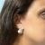 Brinco com Folhas Lisas e Cravejadas de Zircônias Cristais com Pedras e 3 Pérolas Banhado em Ouro 18k - comprar online