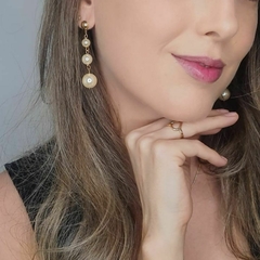 Brinco Feminino Pendente De Pérola Longo Folheado A Ouro 18k na internet