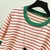 Camiseta Babylook listrada na internet