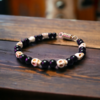 Pulsera calaveras y ónix para caballero con imán