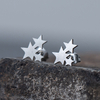 Aretes estrella plateada