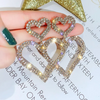 Aretes corazón doble poste de plata .925