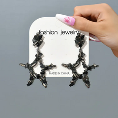 Aretes estrellas incrustación grande en internet
