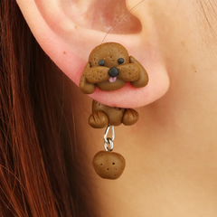 Aretes perrito café