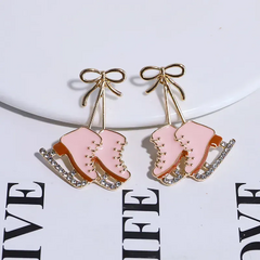 Aretes patines rosas