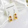 Cerveza corona aretes