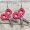 Tijeras aretes
