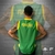 regata-modelo-de-basquete-cor-verde-com-amarelo-masculino