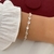 Pulseira de Prata Sete Zircônias. na internet