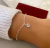Pulseira de Prata Com Coração em Zircônia.