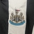 camisa-newcastle-home-titular-i-1-preto-branco-24-25-adidas-torcedor-unissex-gola-v-sela-noon-kit-infantil-short-preto-3.jpg
